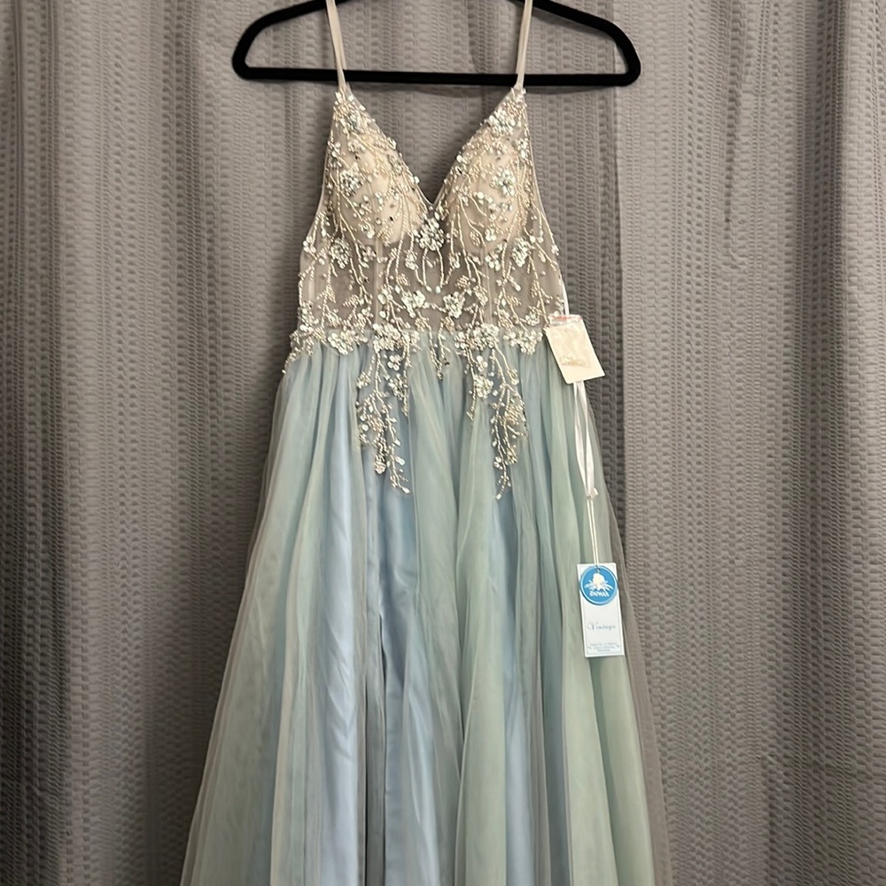 Light blue beaded tulle prom dress